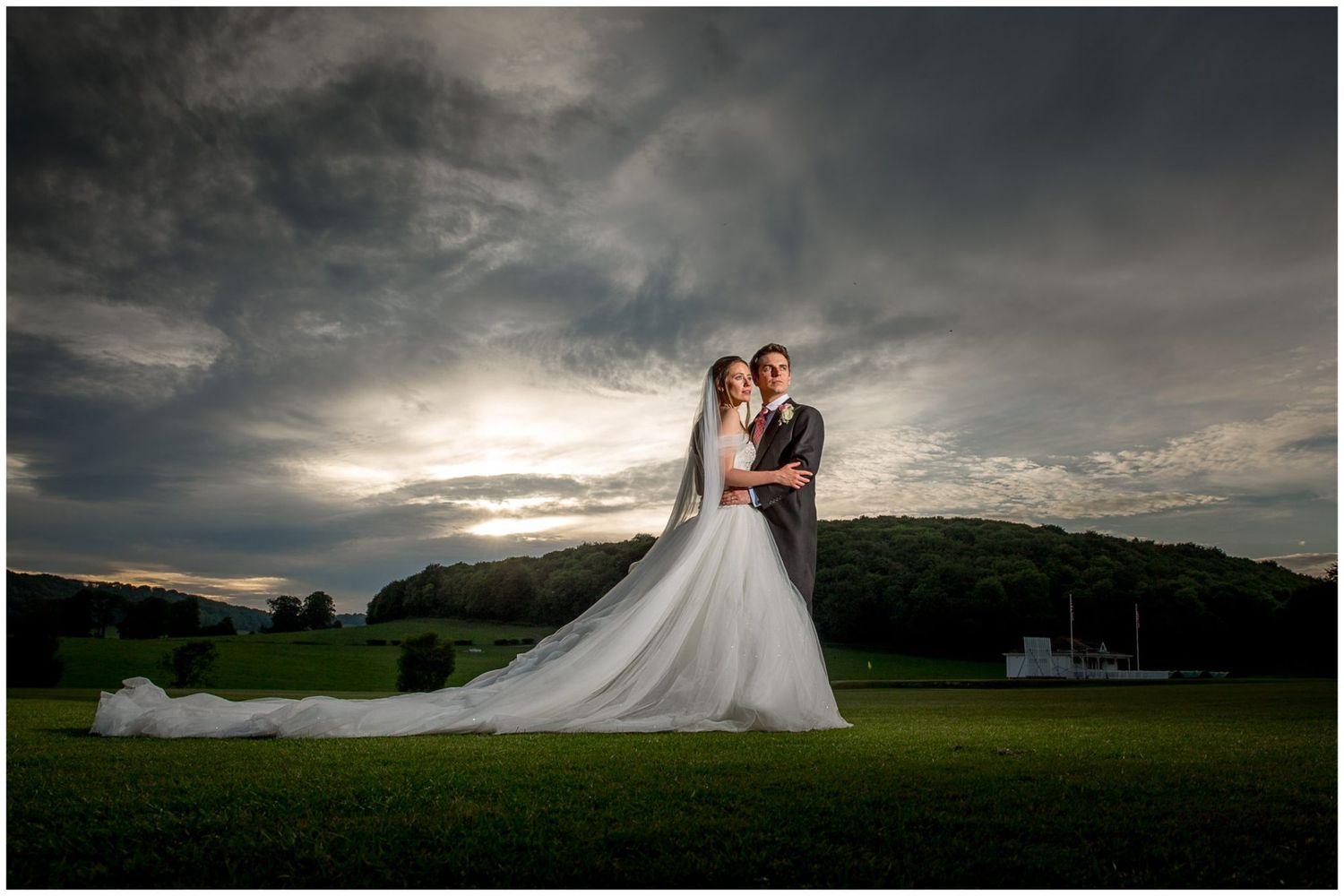 A romantic wedding photo series showing couples against dramatic cloudy skies at sunset in an outdoor setting.