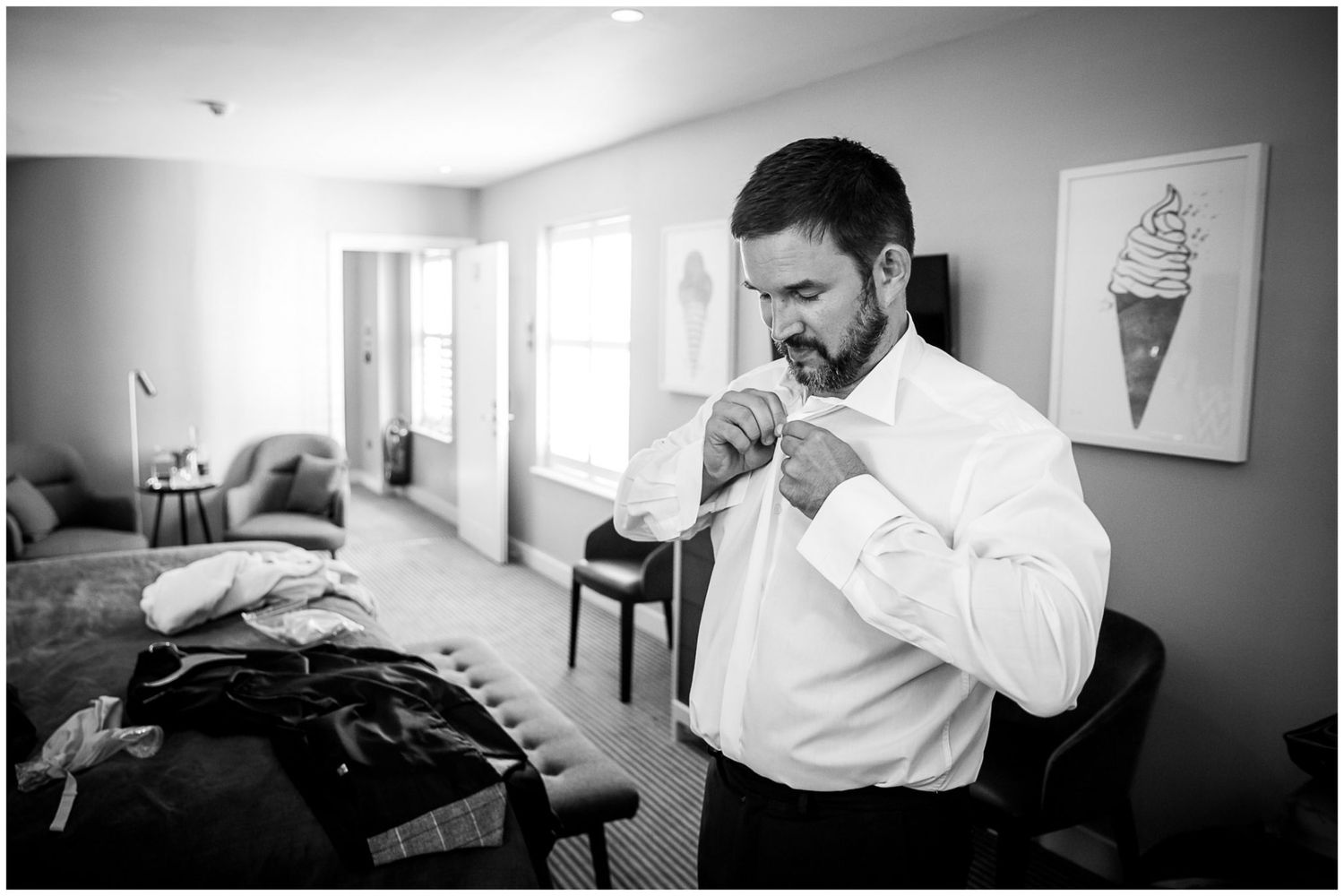 Series of black and white photos showing a dental examination and cleaning procedure in a clinic.