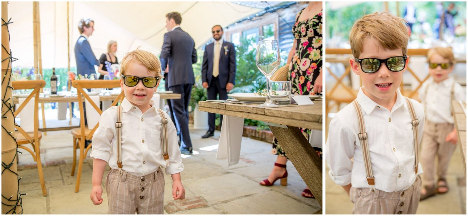 Children playing and guests socializing at rustic outdoor wedding reception.