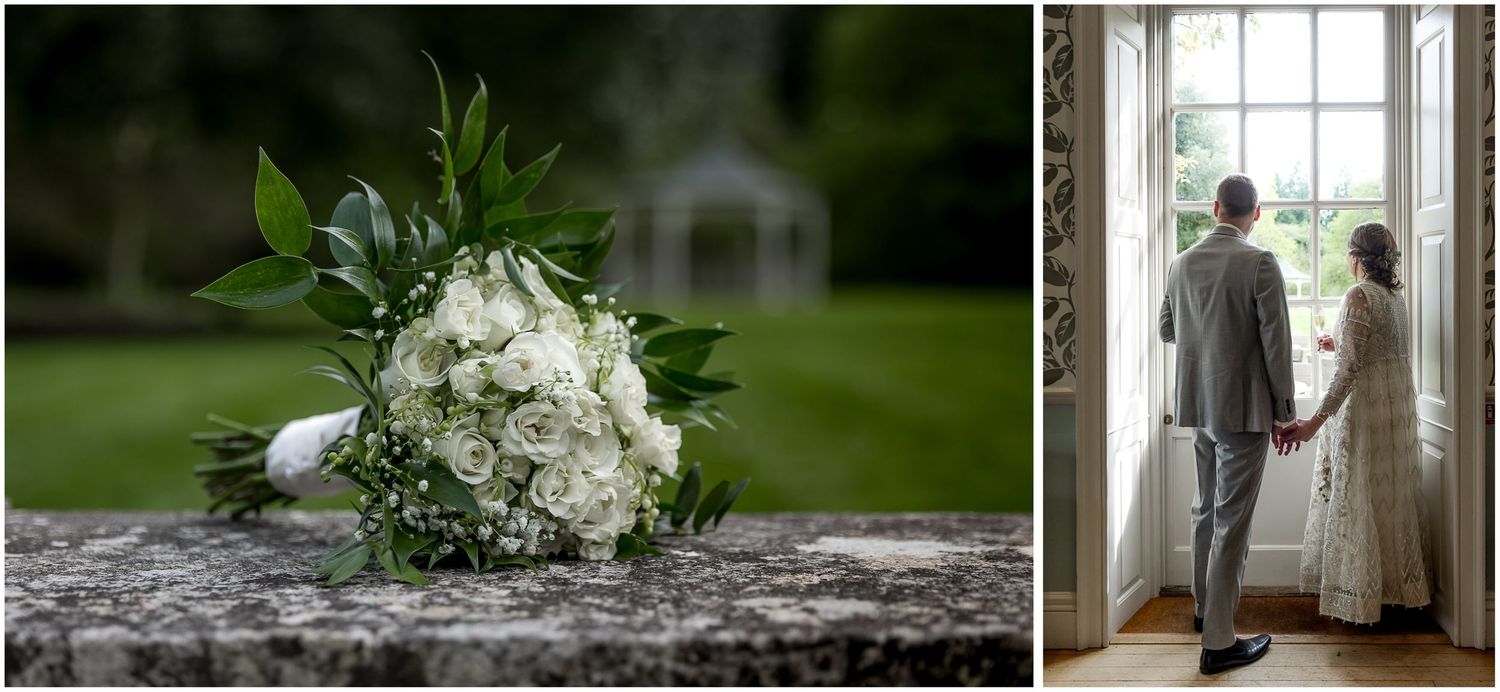 Wedding ceremony details with white floral arrangements and natural window light.