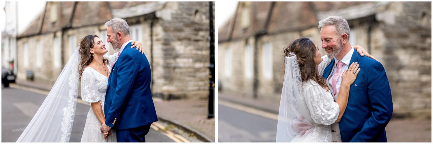 Romantic wedding photography session captured on a quiet town street with classic architecture.