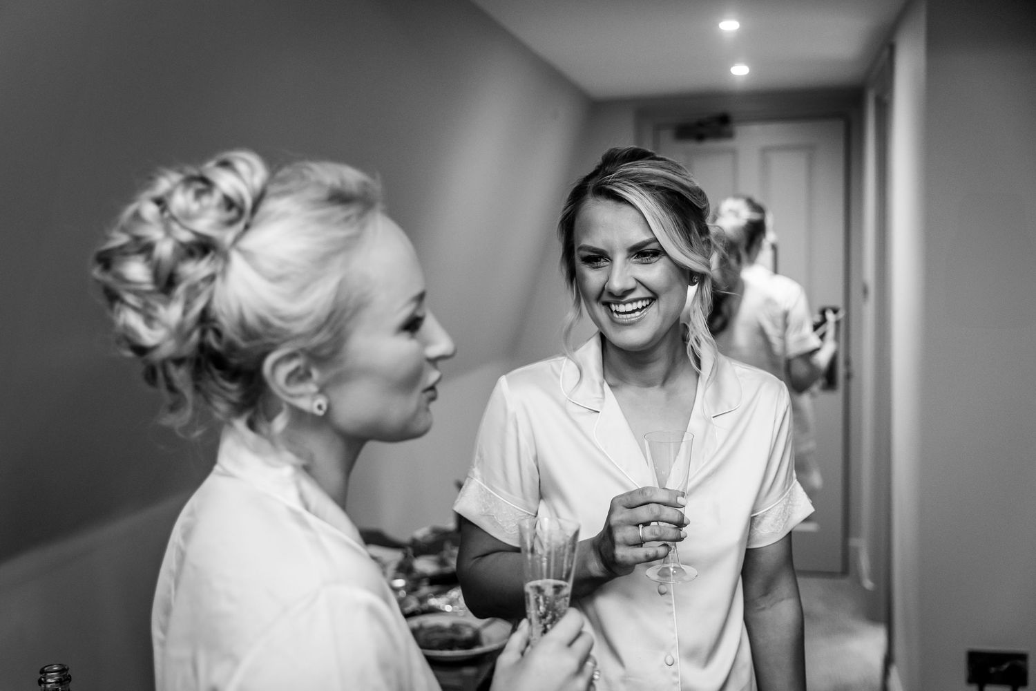 Black and white photos capturing pre-wedding moments and preparations.