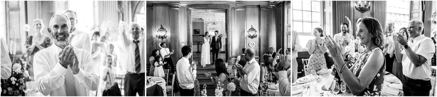 Black and white wedding reception photos showing guests applauding and celebrating at Walhampton School in Hampshire