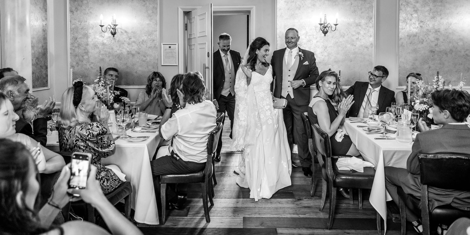 Black and white photographs of wedding reception celebrations and dancing.