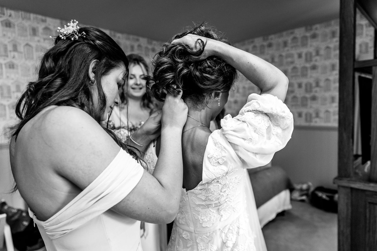 Black and white sequence of wedding preparation moments.