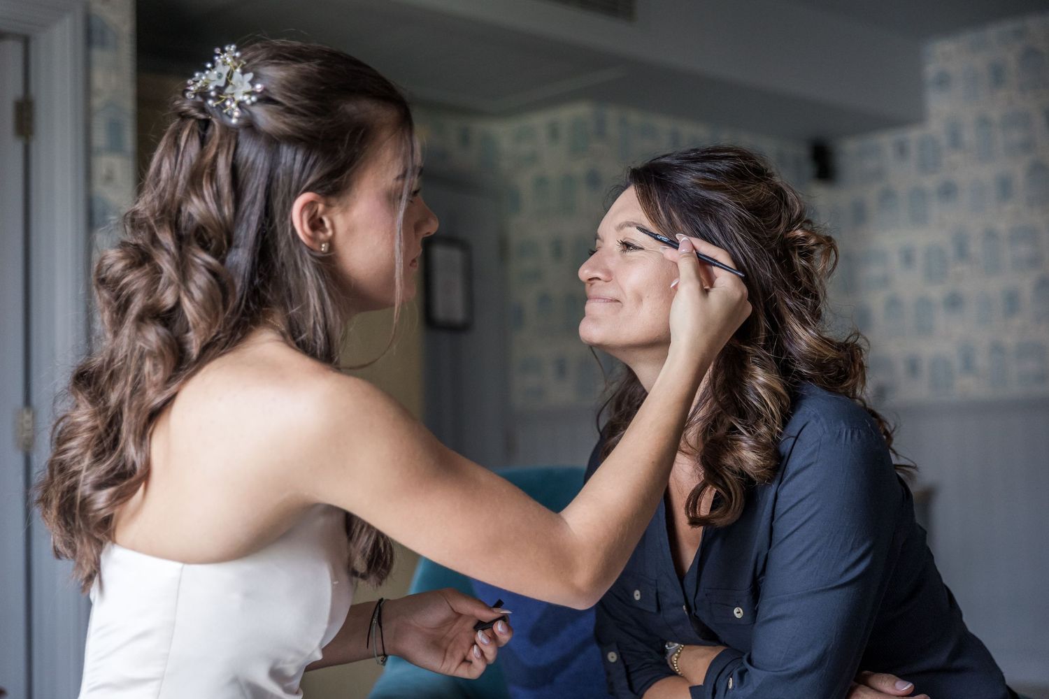 Wedding party members sharing joyful moments and laughter together.