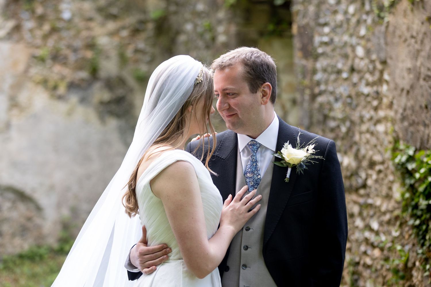 Bride and groom wedding photography in the ruined chapel in the grounds of Lainston House Hotel in Winchester