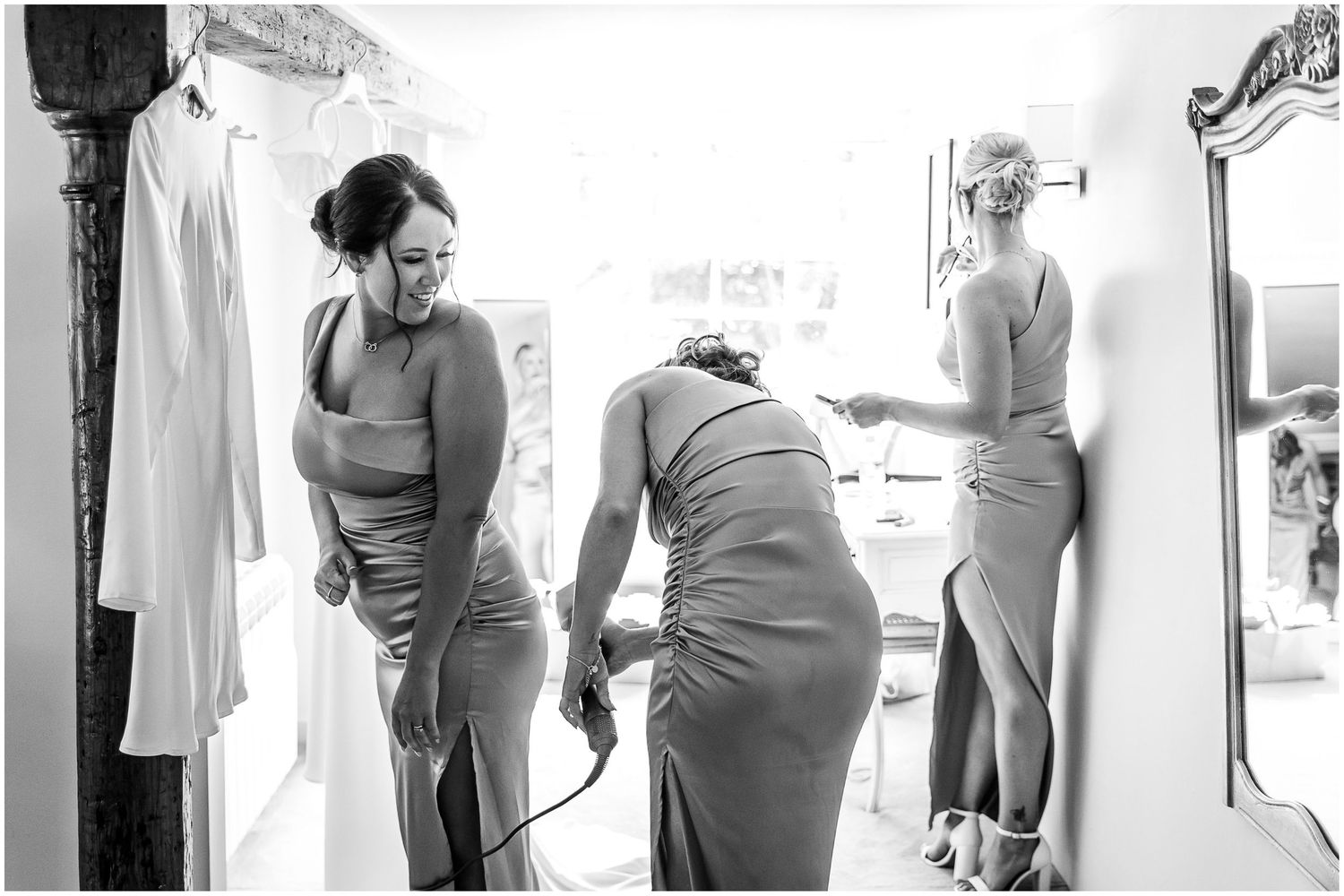 Black and white series of intimate getting-ready moments before the ceremony.