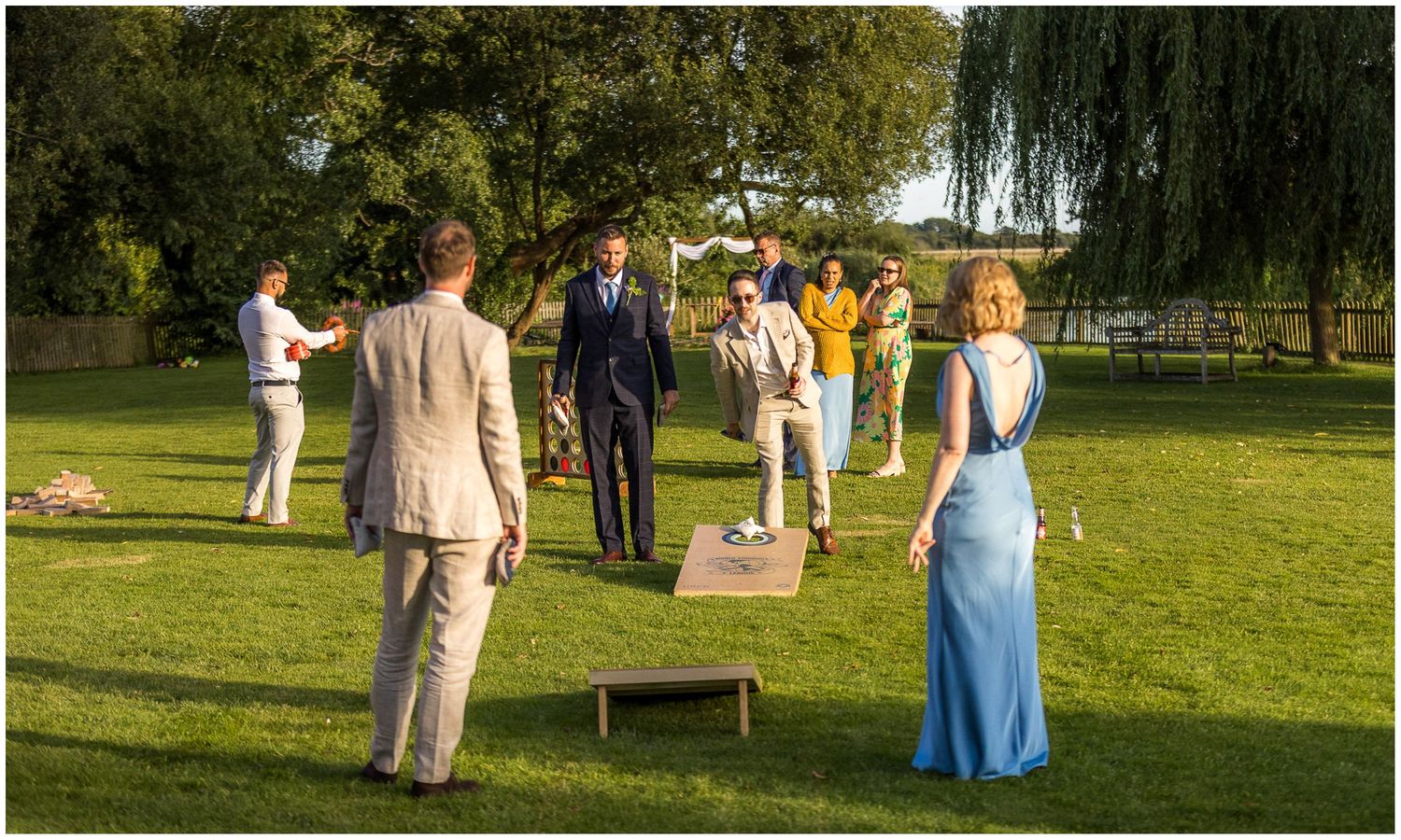 Wedding guests playing garden games at Sopley Mill in Dorset