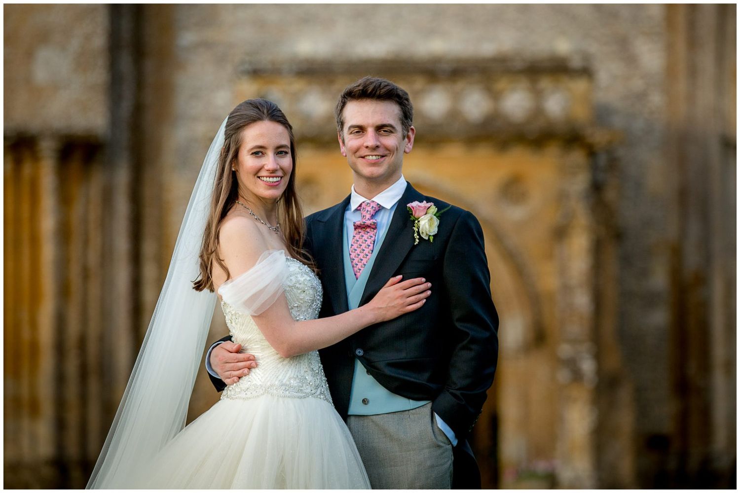 Bride and groom share tender moments in a series of romantic wedding portraits against stone architecture.