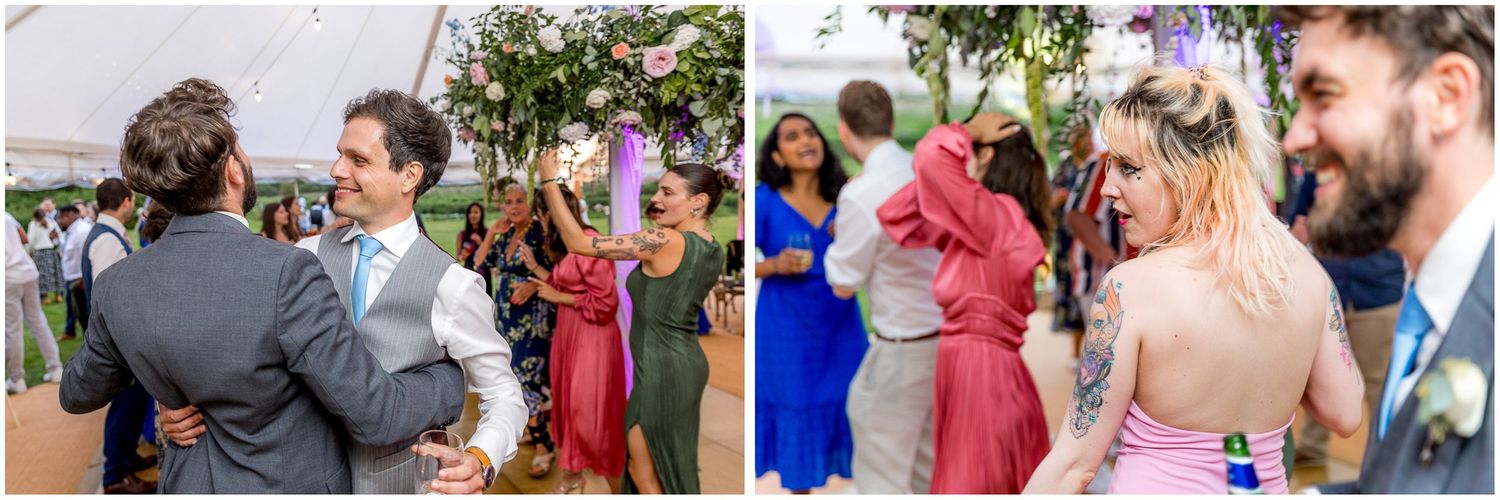 Wedding guests mingle and socialize during an outdoor garden reception.