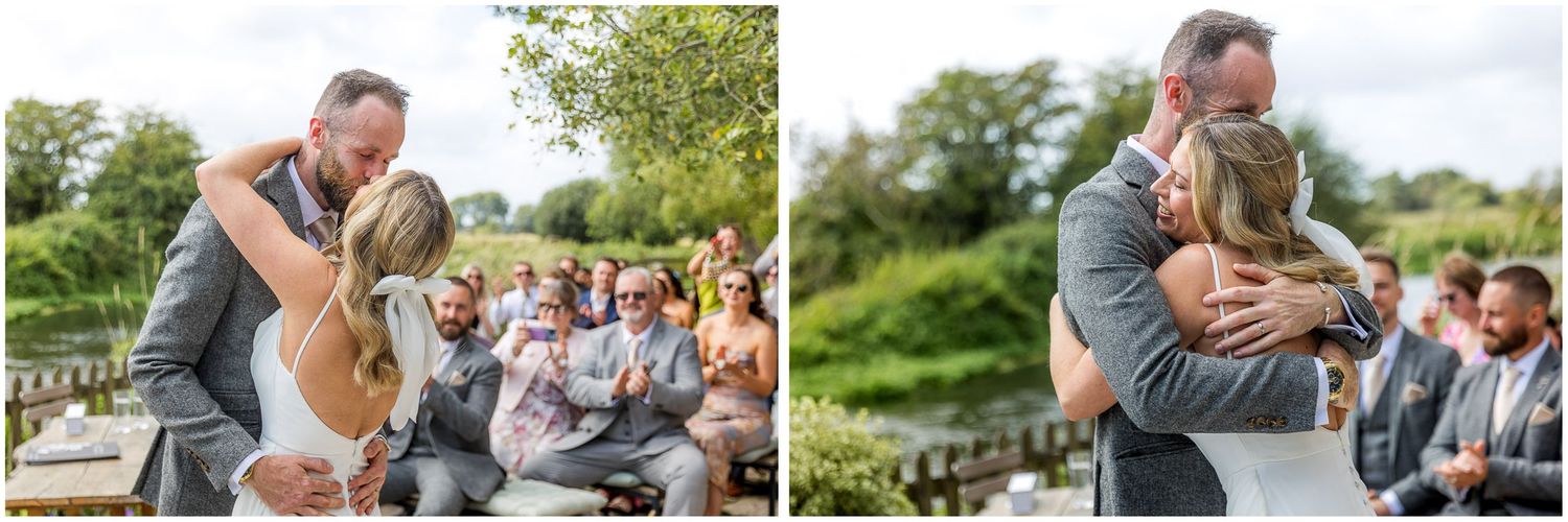 Wedding party celebrates together in a scenic garden setting.