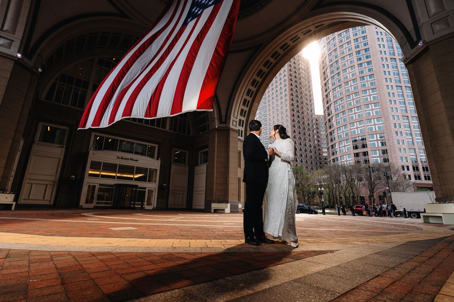 Low-angle views of American flags and modern architecture creating dramatic compositions.