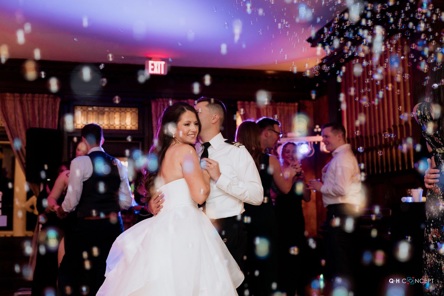 Wedding reception dance floor with sparkling lights and festive atmosphere.