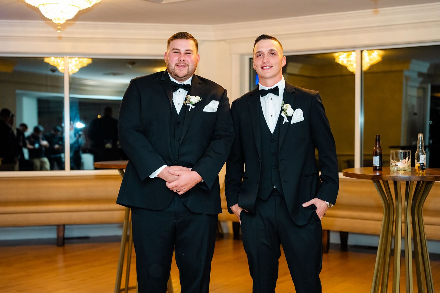 Formal event space with black-tie guests enjoying an elegant evening celebration.
