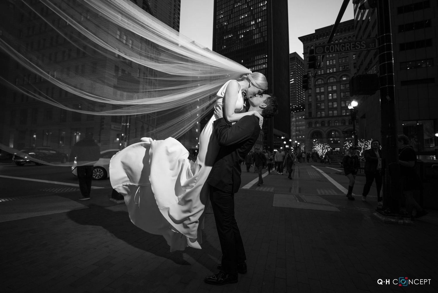 A black and white photo series showing wedding photography moments with a flowing veil and elegant poses.