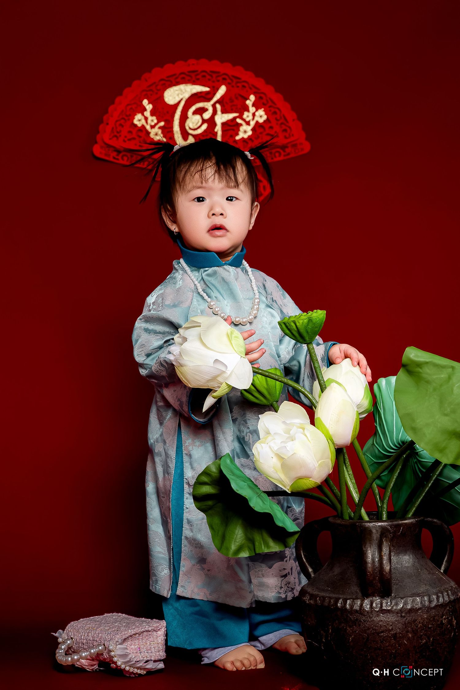 A series of artistic photos with lotus flowers against a deep red backdrop in traditional Asian style composition.