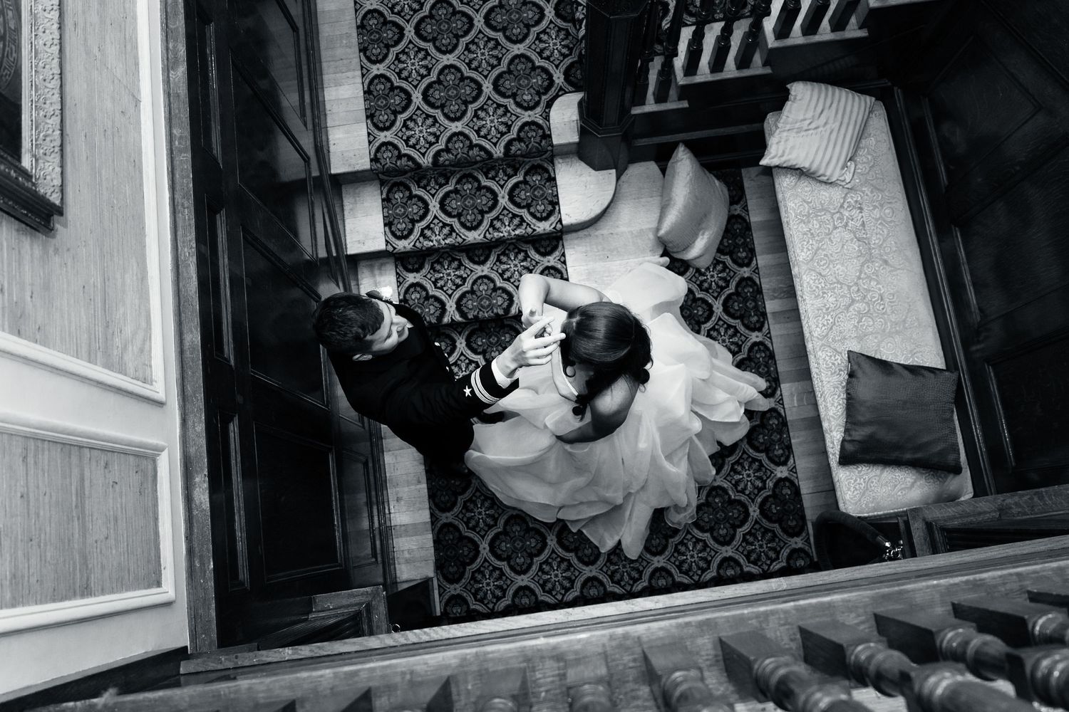 Black and white wedding dance photos showing couples in elegant motion.