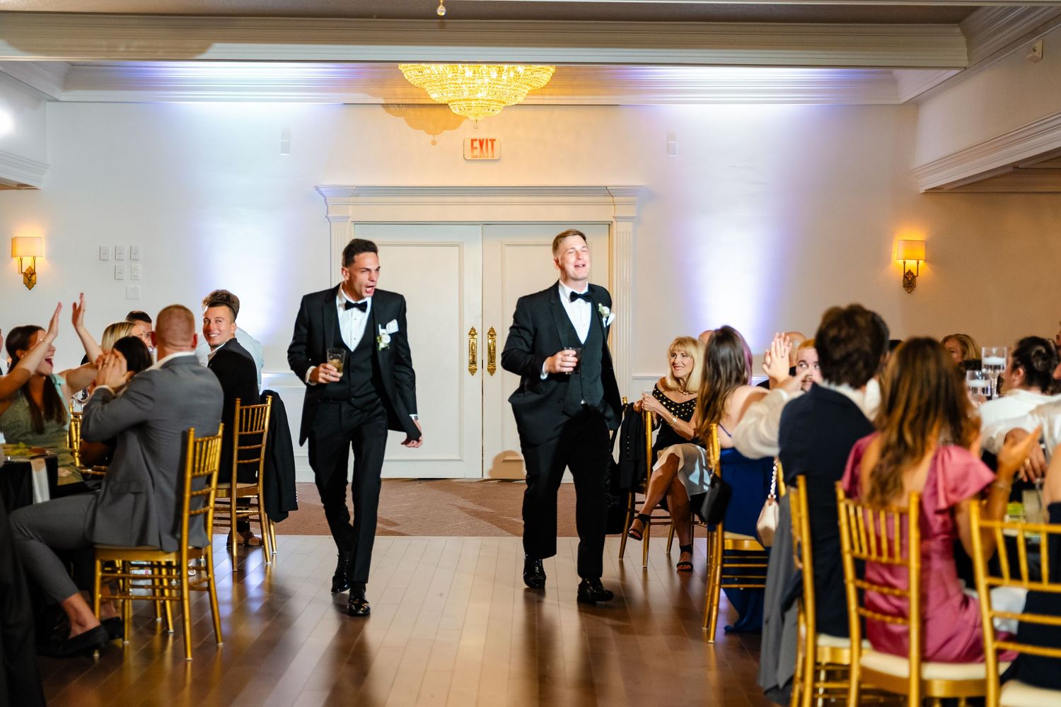 A sequence of wedding reception photos showing guests dancing and mingling in an elegant white ballroom setting.