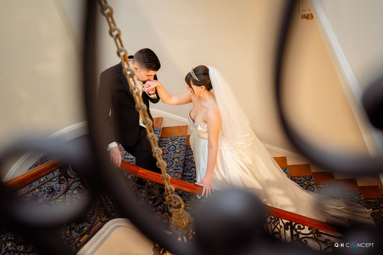 An artistic wedding photo with selective focus and soft lighting creating an intimate atmosphere.