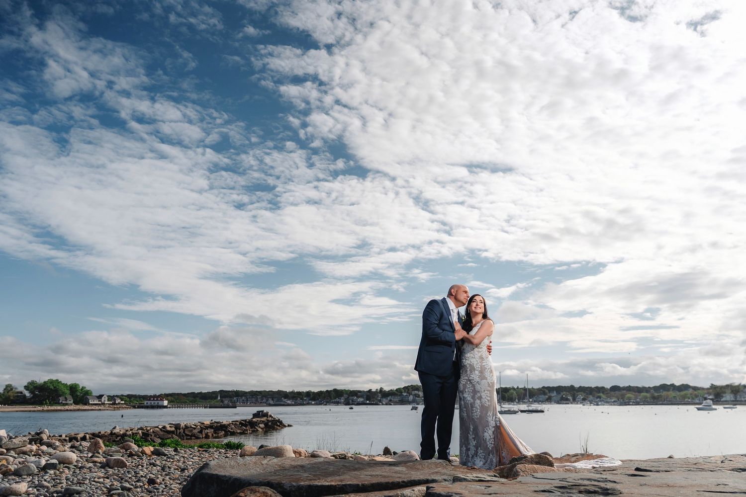 Panoramic sequence of cloudy sky over coastal waterfront with dramatic cloud formations at sunset.