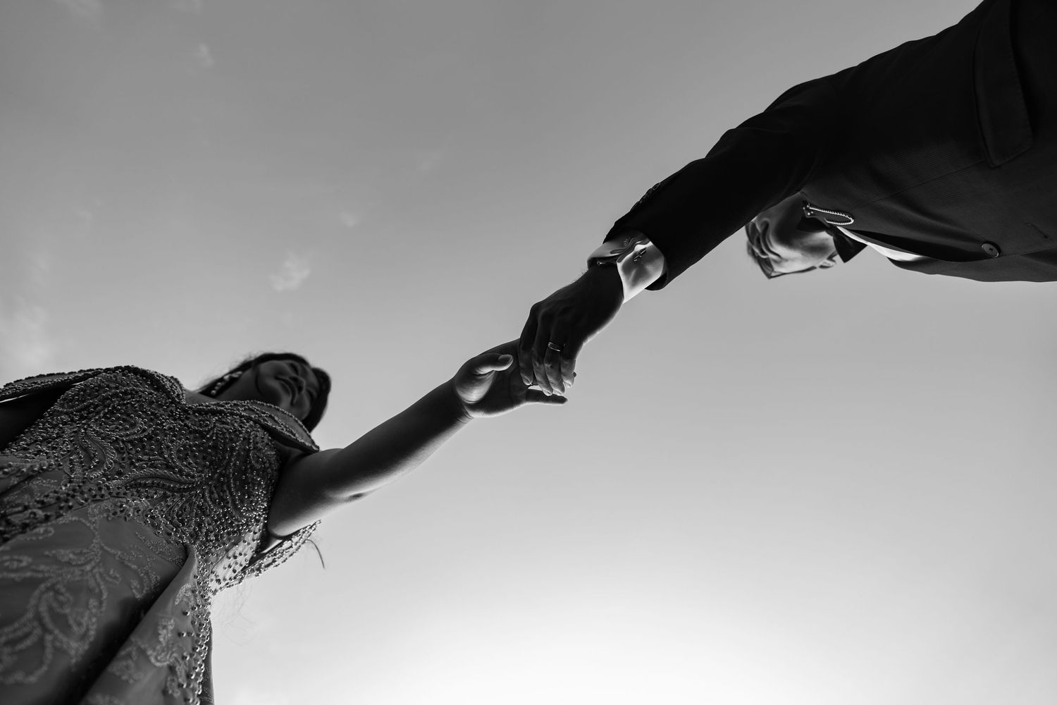 Artistic black and white silhouettes capture intimate wedding moments.