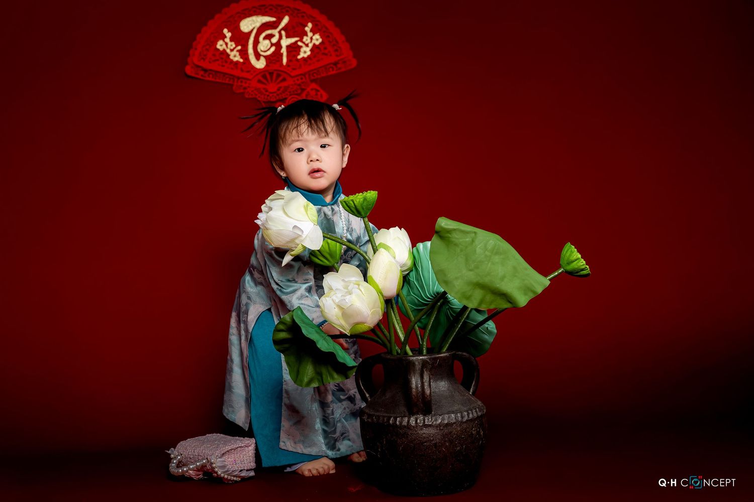 A series of Chinese New Year themed photos with red backdrop showing traditional decorations and festive celebrations.