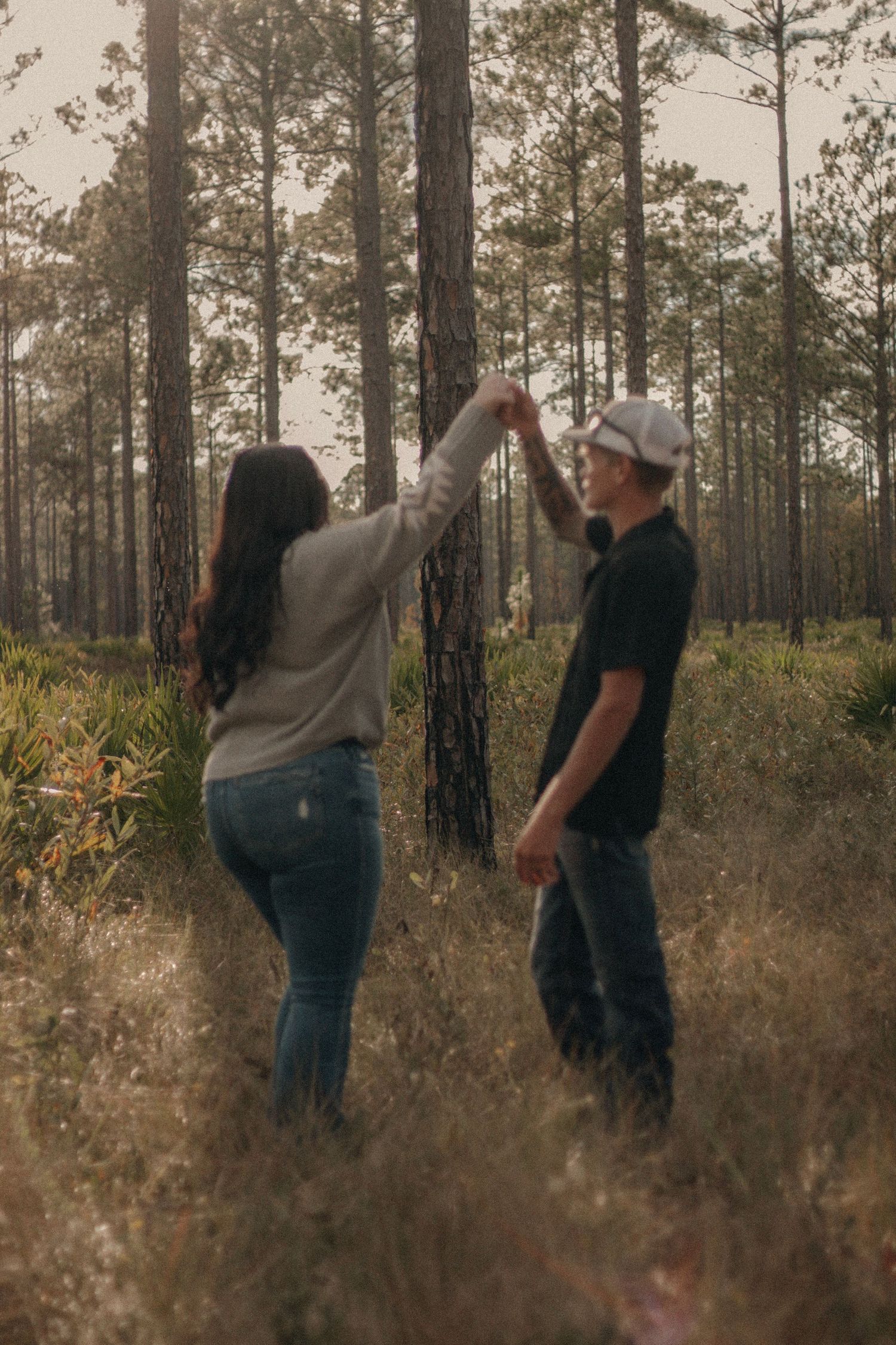Couple session in a field setting