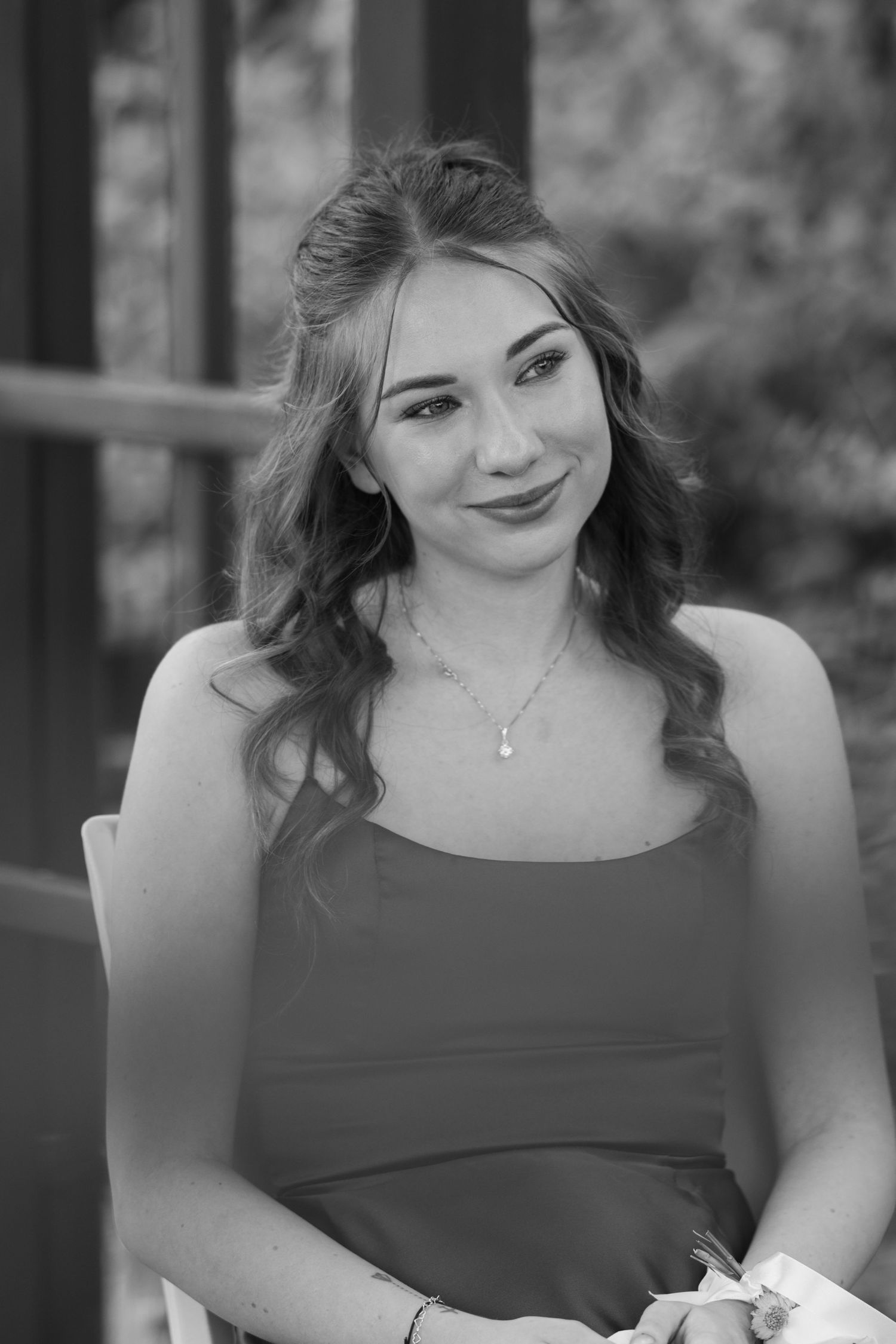 Black and white portrait series showing joyful expressions.
