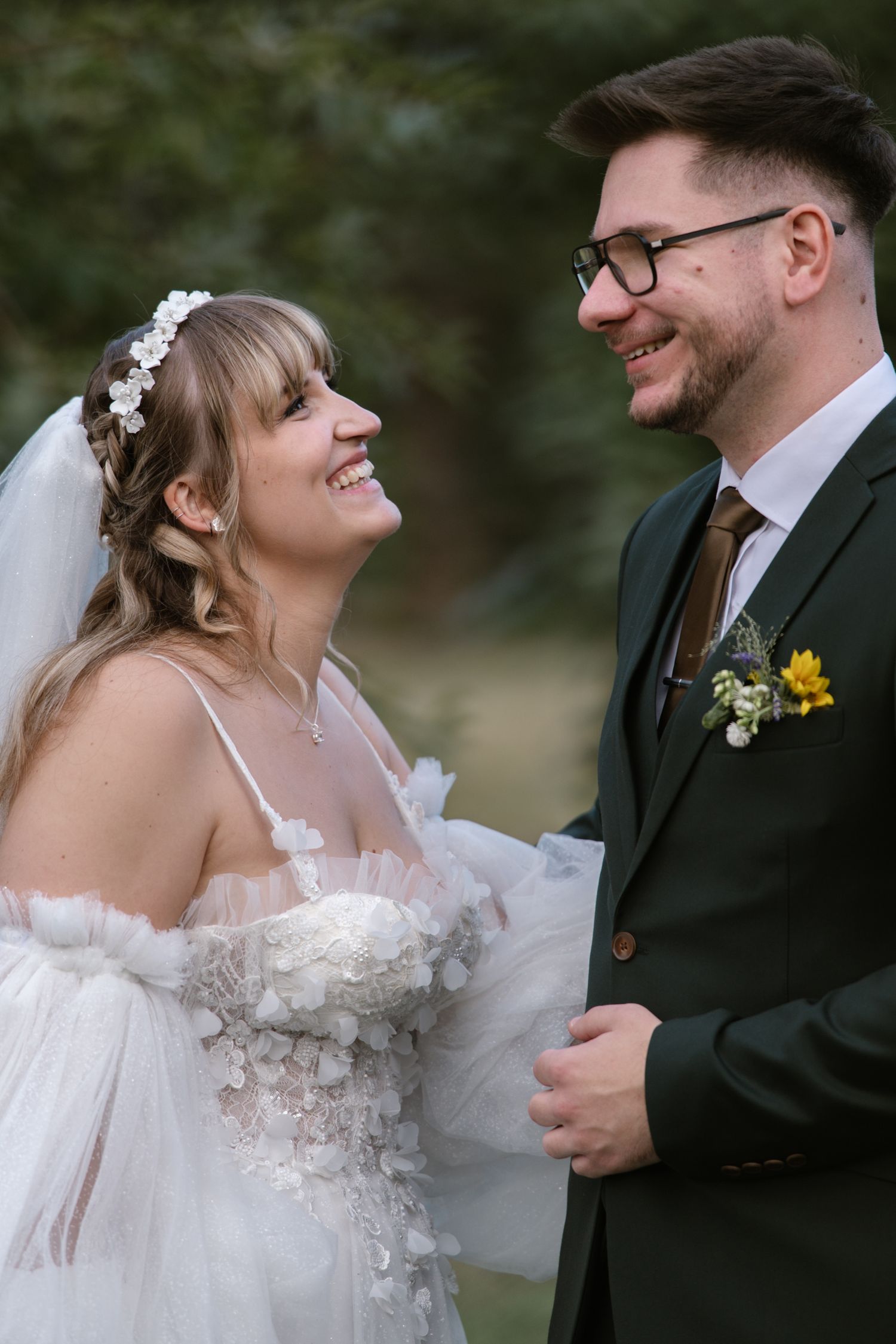 Intimate wedding portraits showing joyful moments between newlyweds.