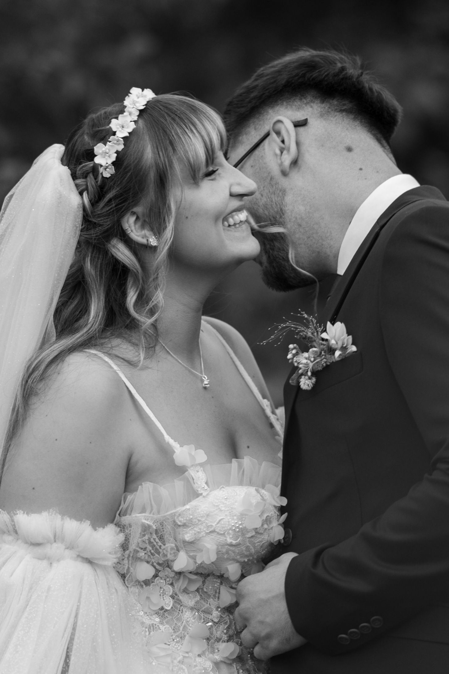 Romantic black and white wedding portrait sequence showing tender moments between newlyweds.