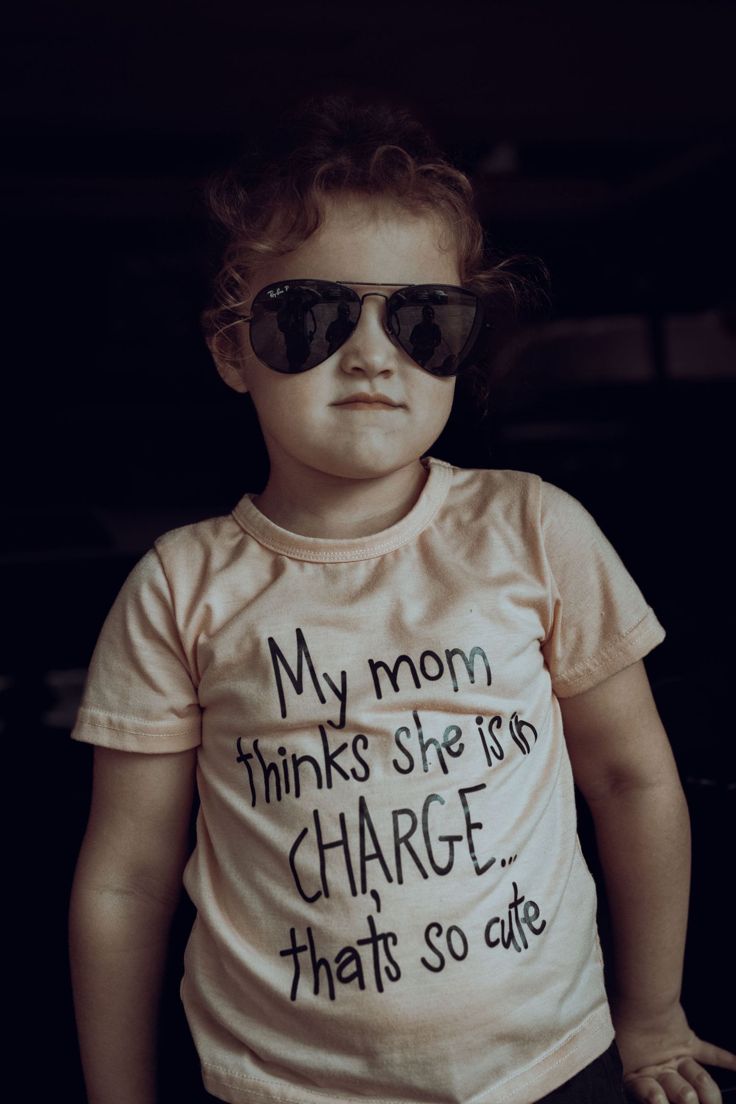Young child in sunglasses.