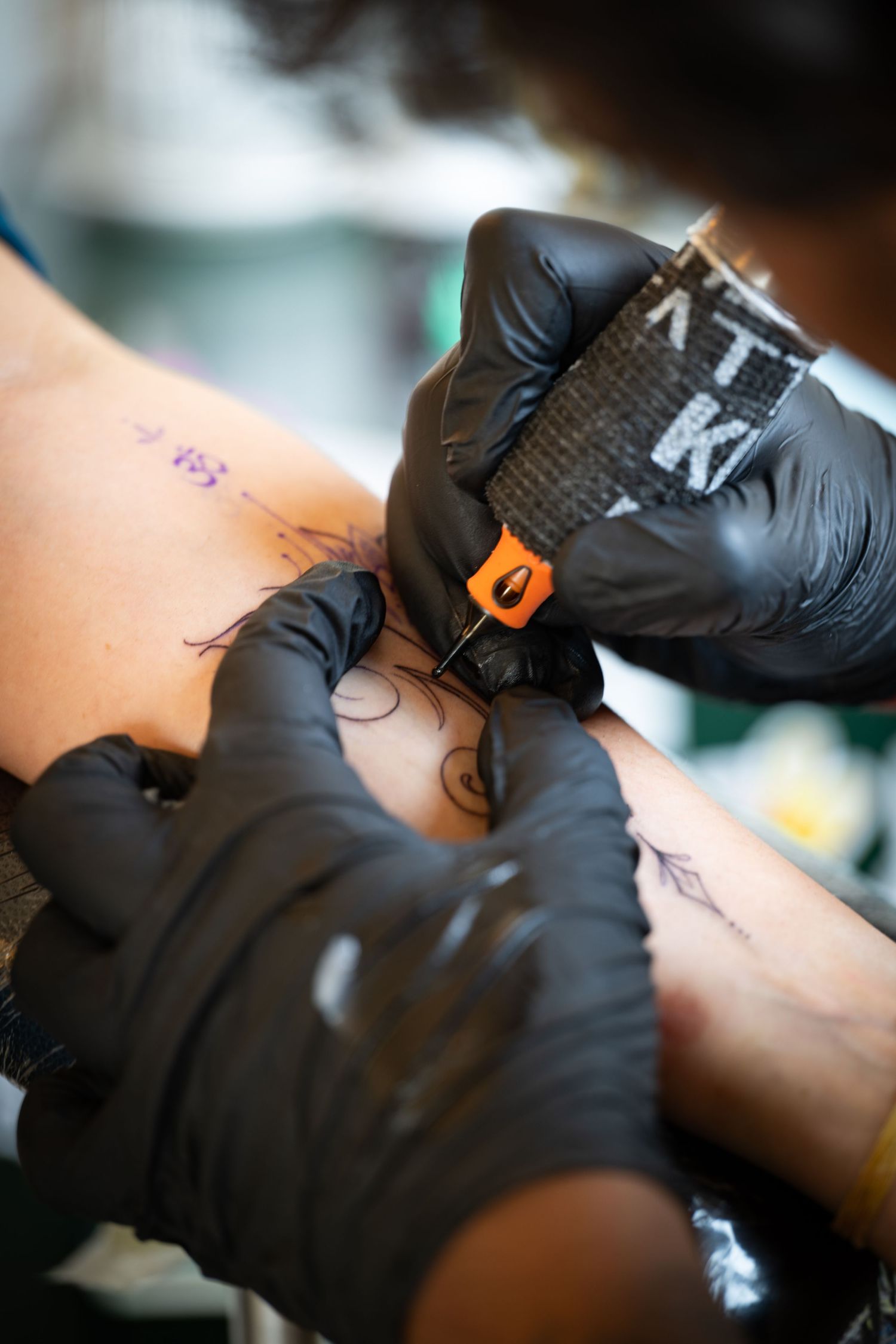 Tattoo artist at a studio in Delhi.