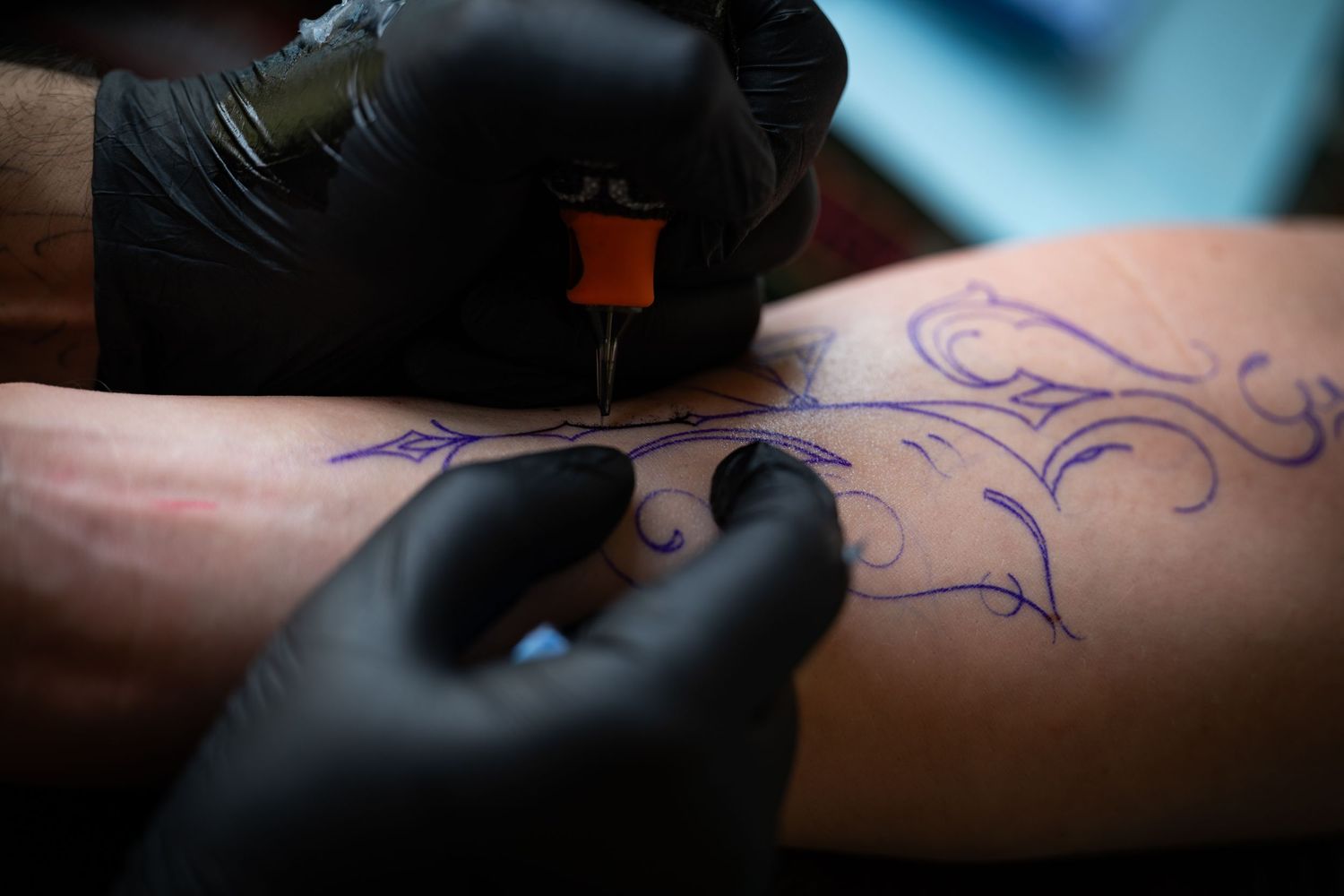 Tattoo artist at a studio in Delhi.