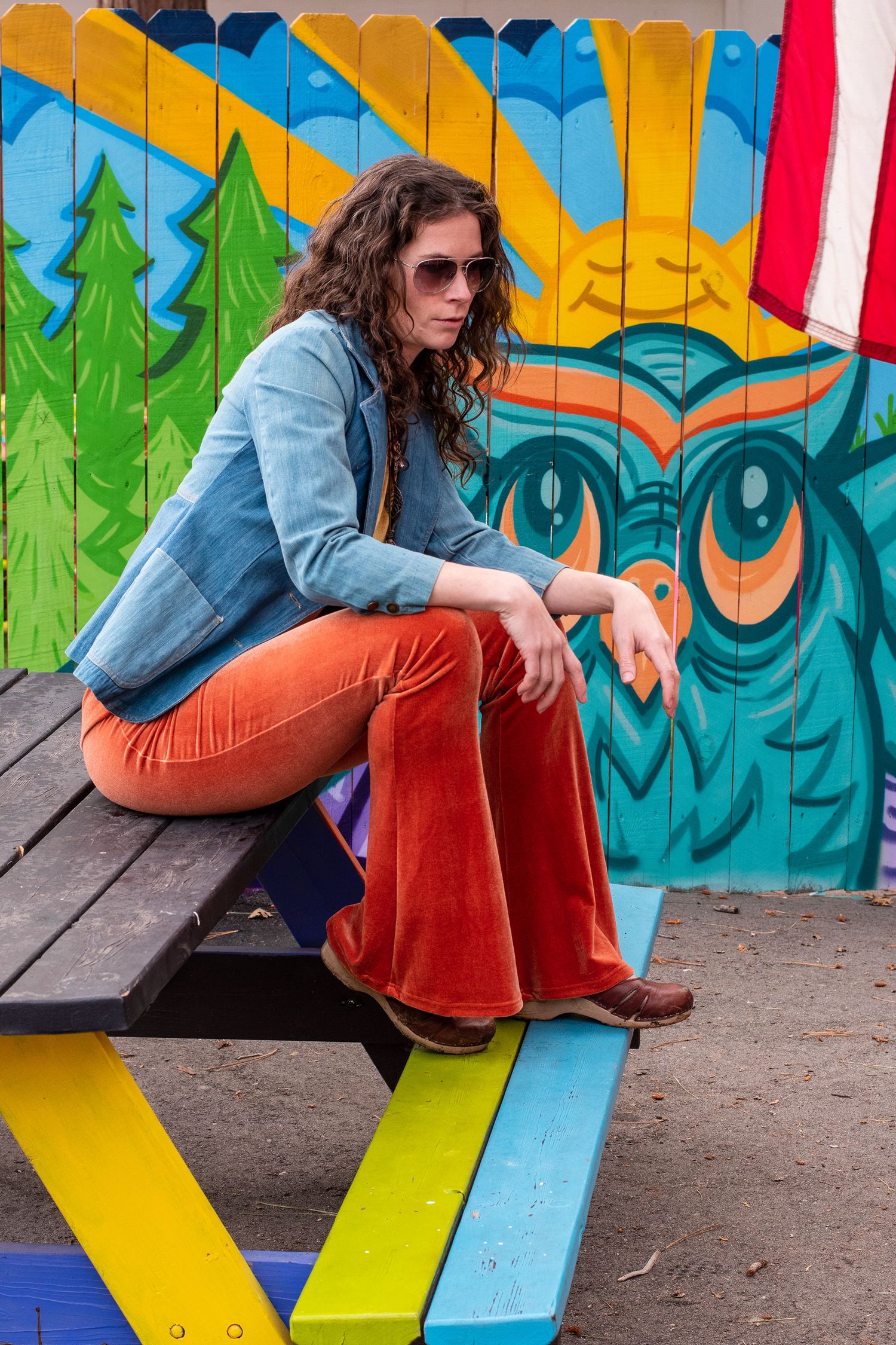 Model with Nicholas Danger mural at Wild Idy in Idyllwild, CA. By California Lifestyle Photographer.