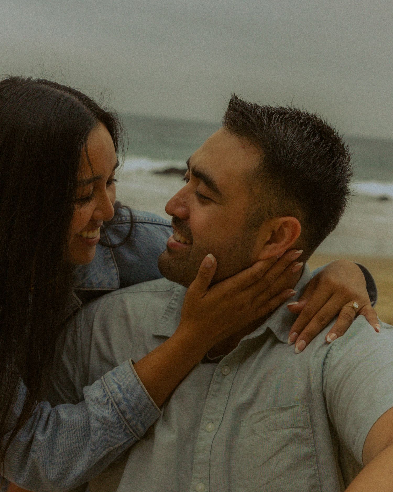 Intimate sequence of photos showing a couple sharing tender moments against a moody background.