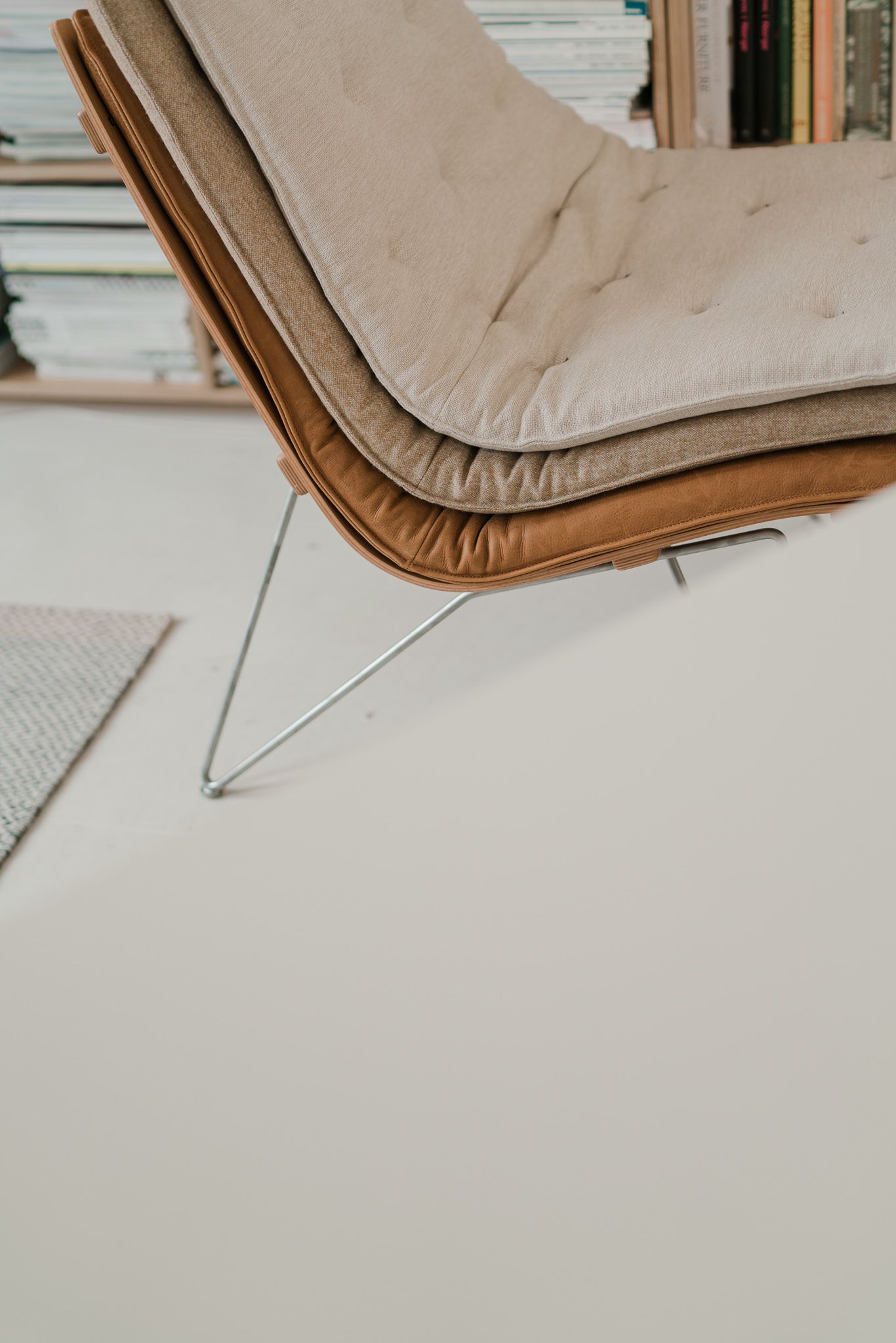 Close-up progression of brown leather material being folded and creased to create texture and dimension.