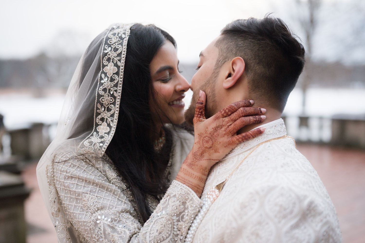Close-up wedding portraits showing intimate moments between the couple.