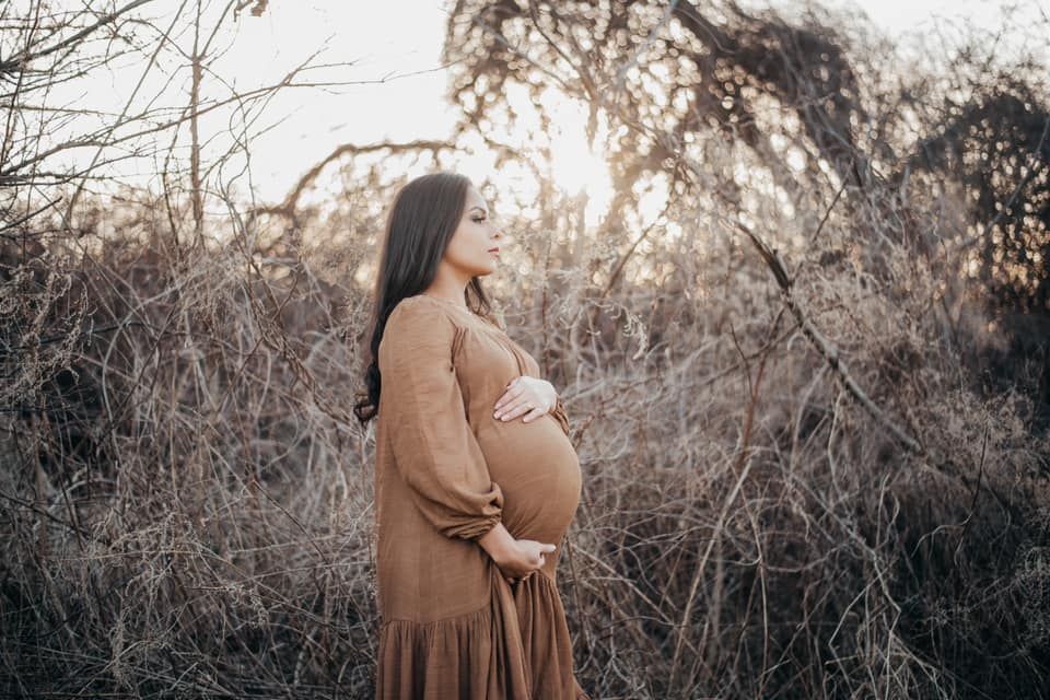 Maternity silhouette photos at sunset showing the beauty of pregnancy.