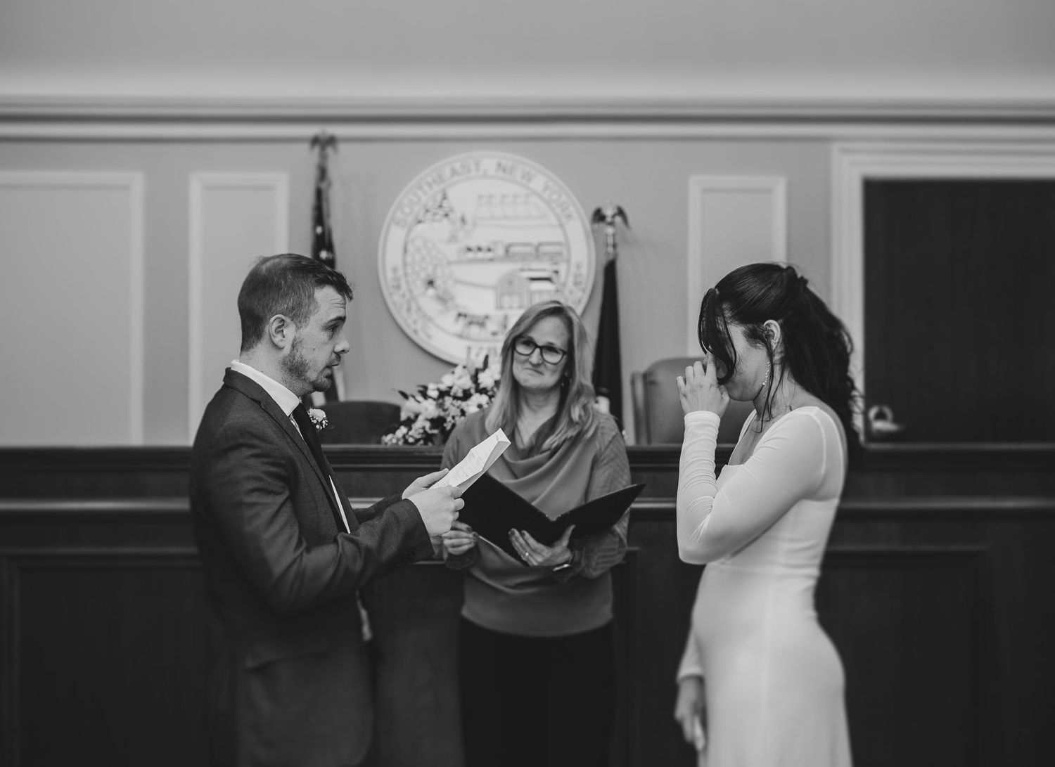 Indoor ceremony space with elegant lighting and formal decor.