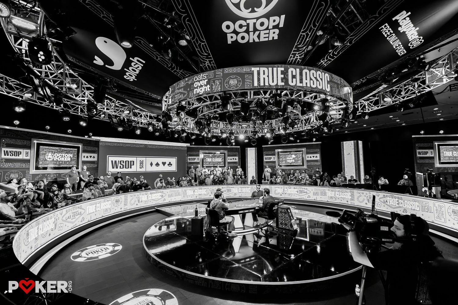 Black and white photo of the WSOP True Classic poker tournament main stage at Octopi Poker arena.