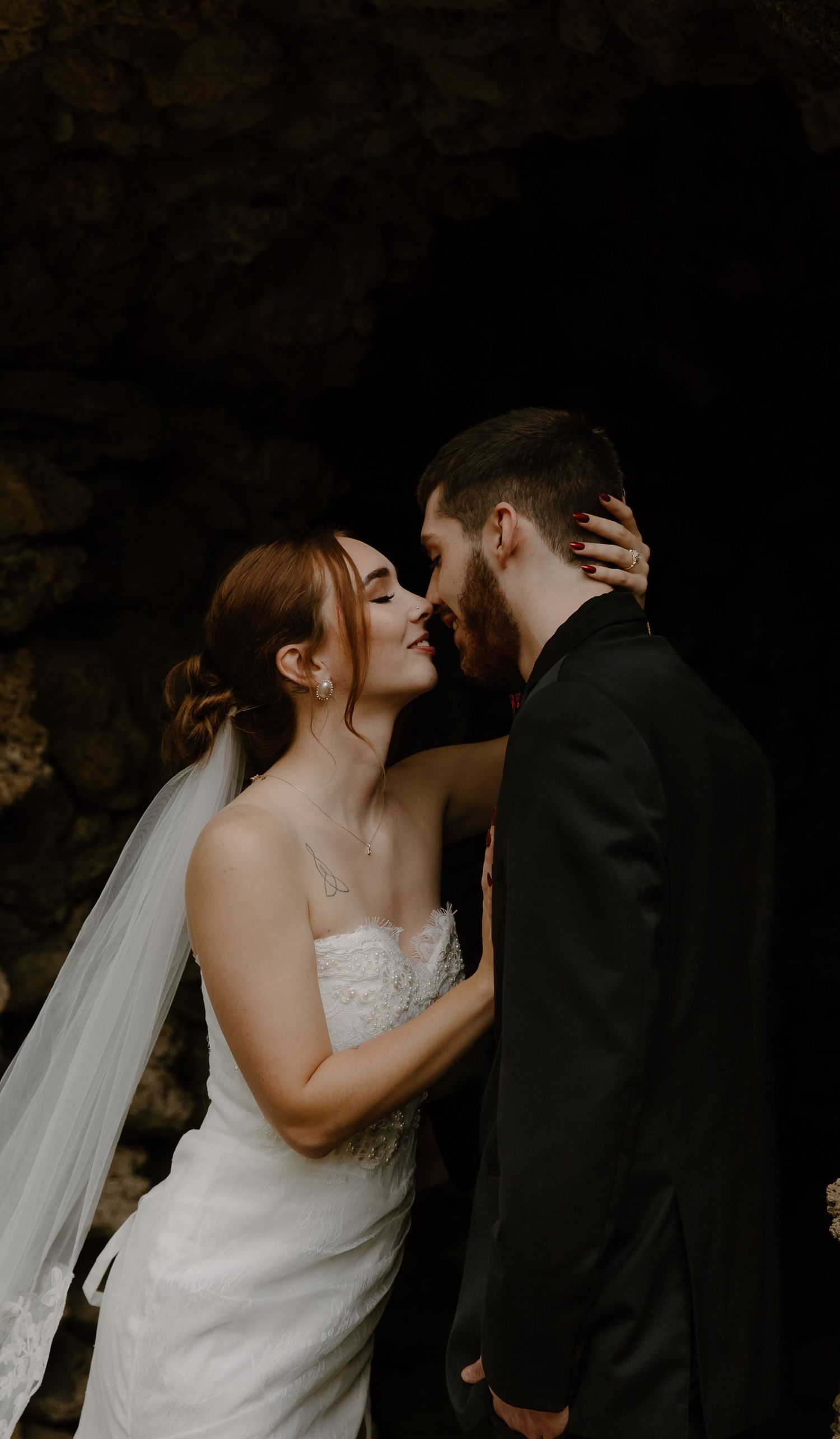 A romantic sequence of elopement photos showing tender moments between newlyweds against a dark background.
