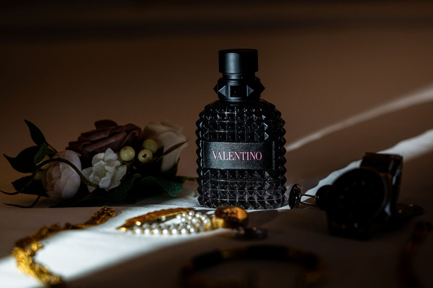 A dark artistic photo series showing fountain pen nibs, ink bottles, and writing implements in dramatic lighting.