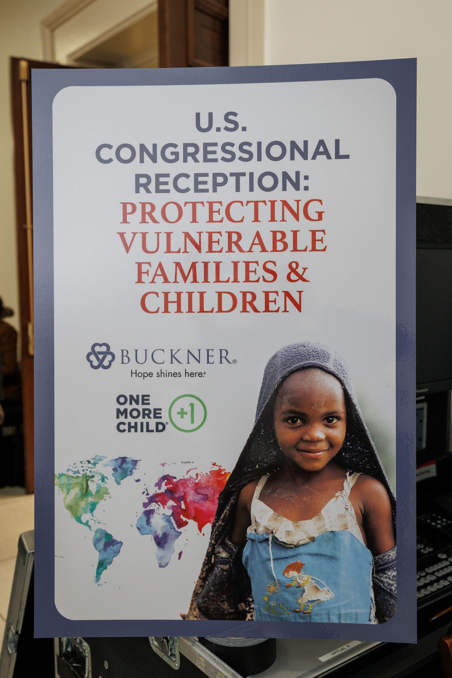 U.S. Congressional Reception sign for Protecting Vulnerable Families & Children by Buckner and One More Child organizations.