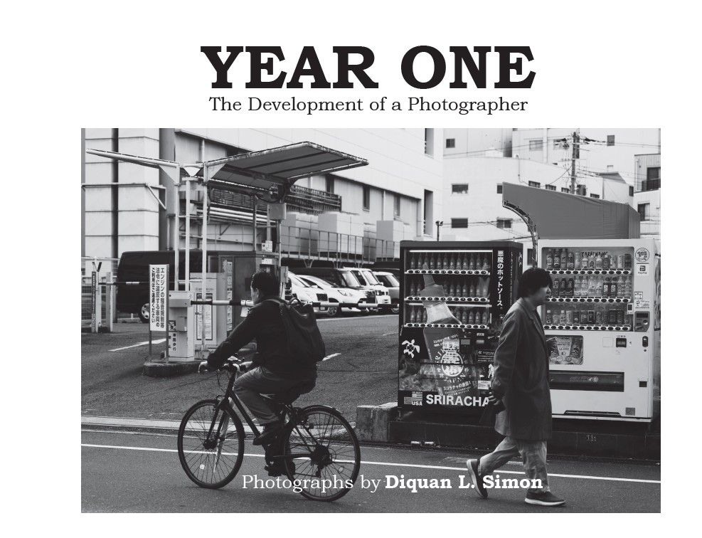 Black and white book cover showing cyclist on urban street with Year One title.
