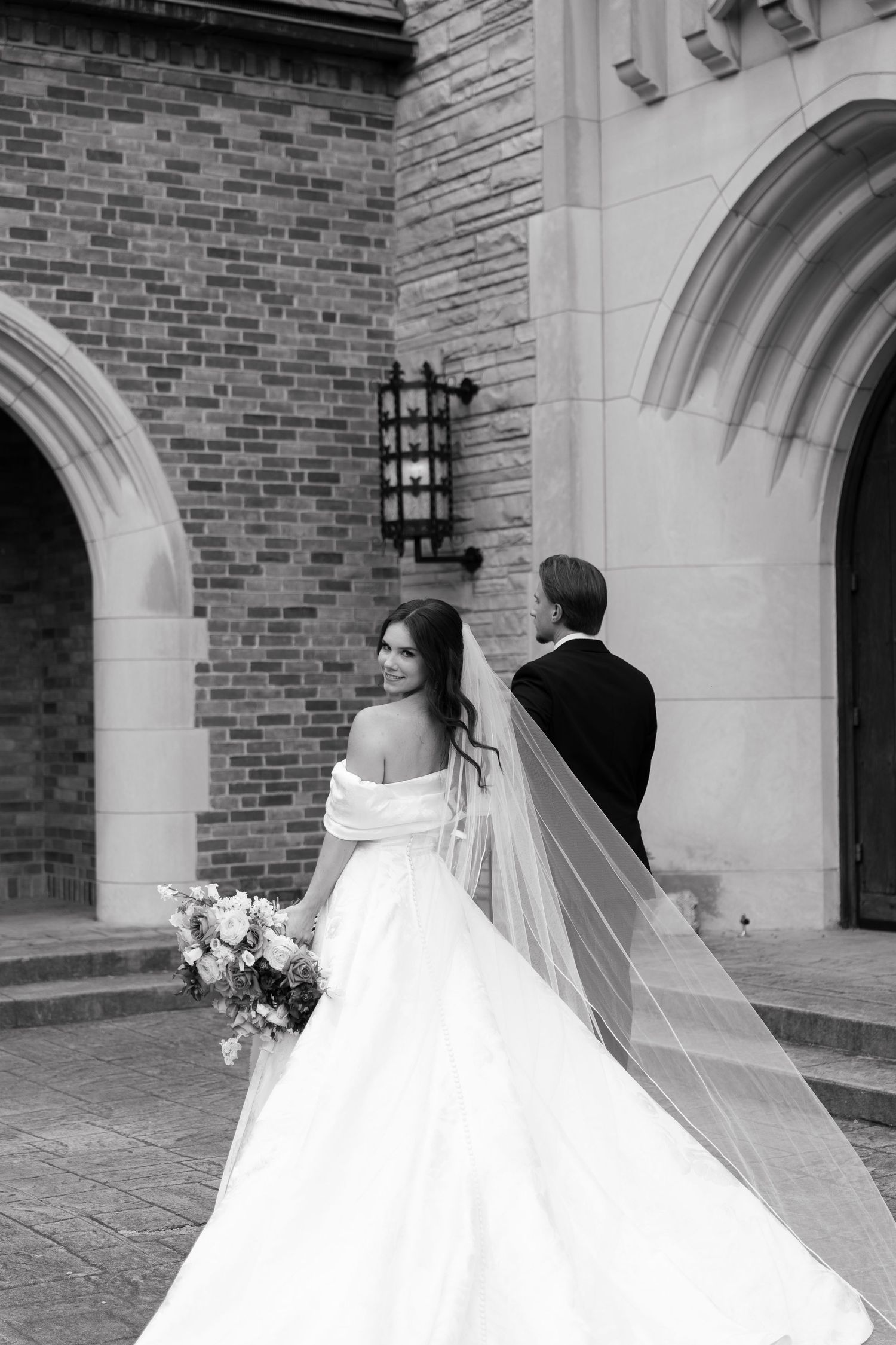 A series of black and white wedding photographs showing a couple from behind on a church portico with elegant archways.