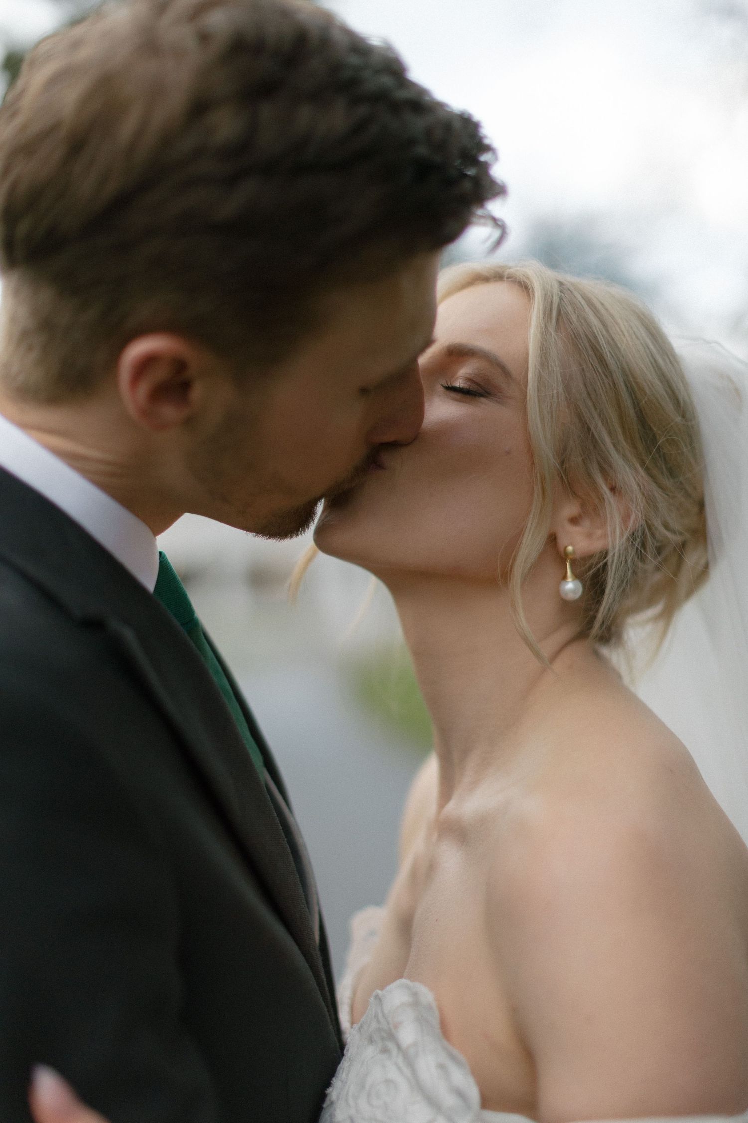 Intimate wedding portrait moments captured in soft focus.