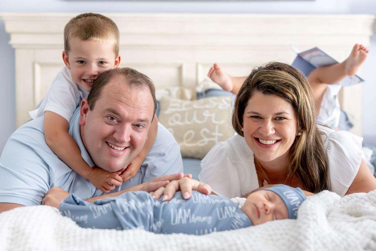 Candid family photos showing playful interactions on a white bed.