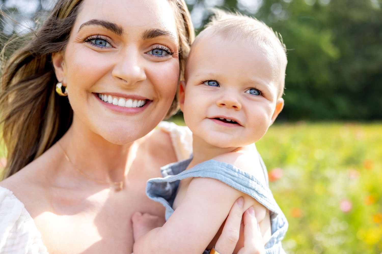 Sunny outdoor portrait capturing a joyful moment in a summer field at Blue Hill Garden in Monroe, NC.