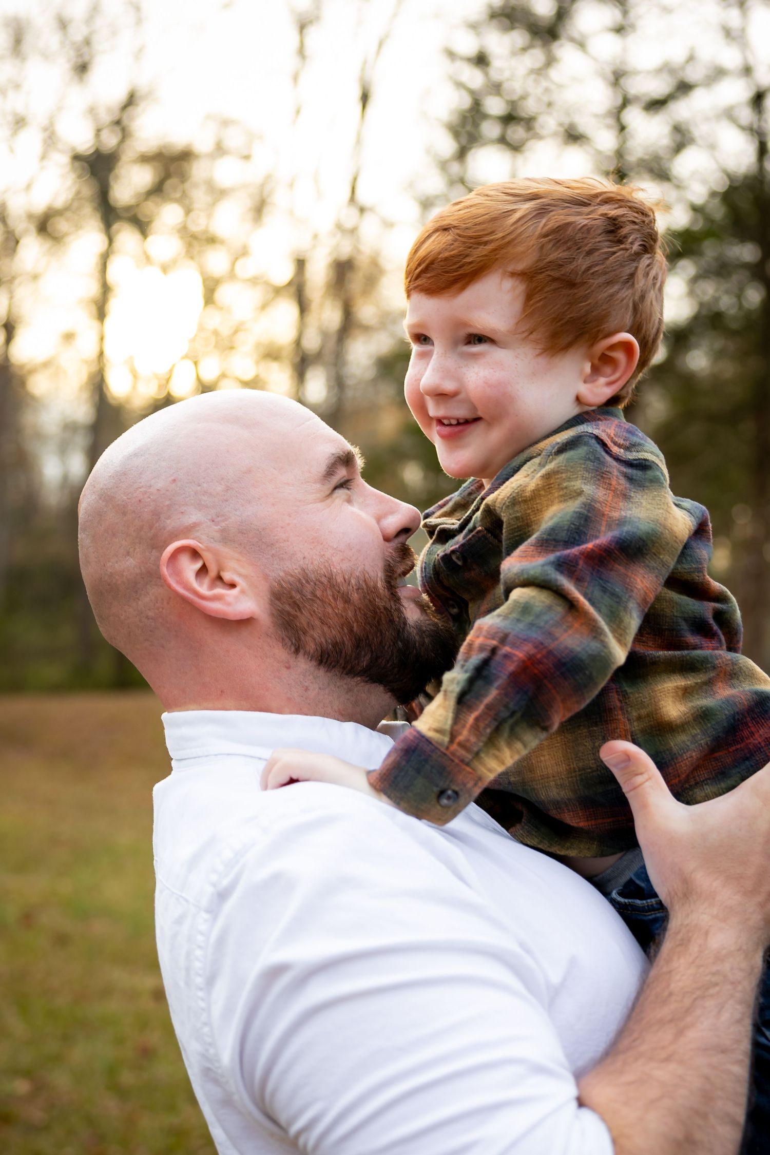 A touching series of playful interactions between parent and child outdoors during golden hour.